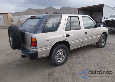 1997 Isuzu Rodeo Ls 3.2L/S 3.2L z USA, uszkodzony, nr VIN 4S2CM58V6V4350882